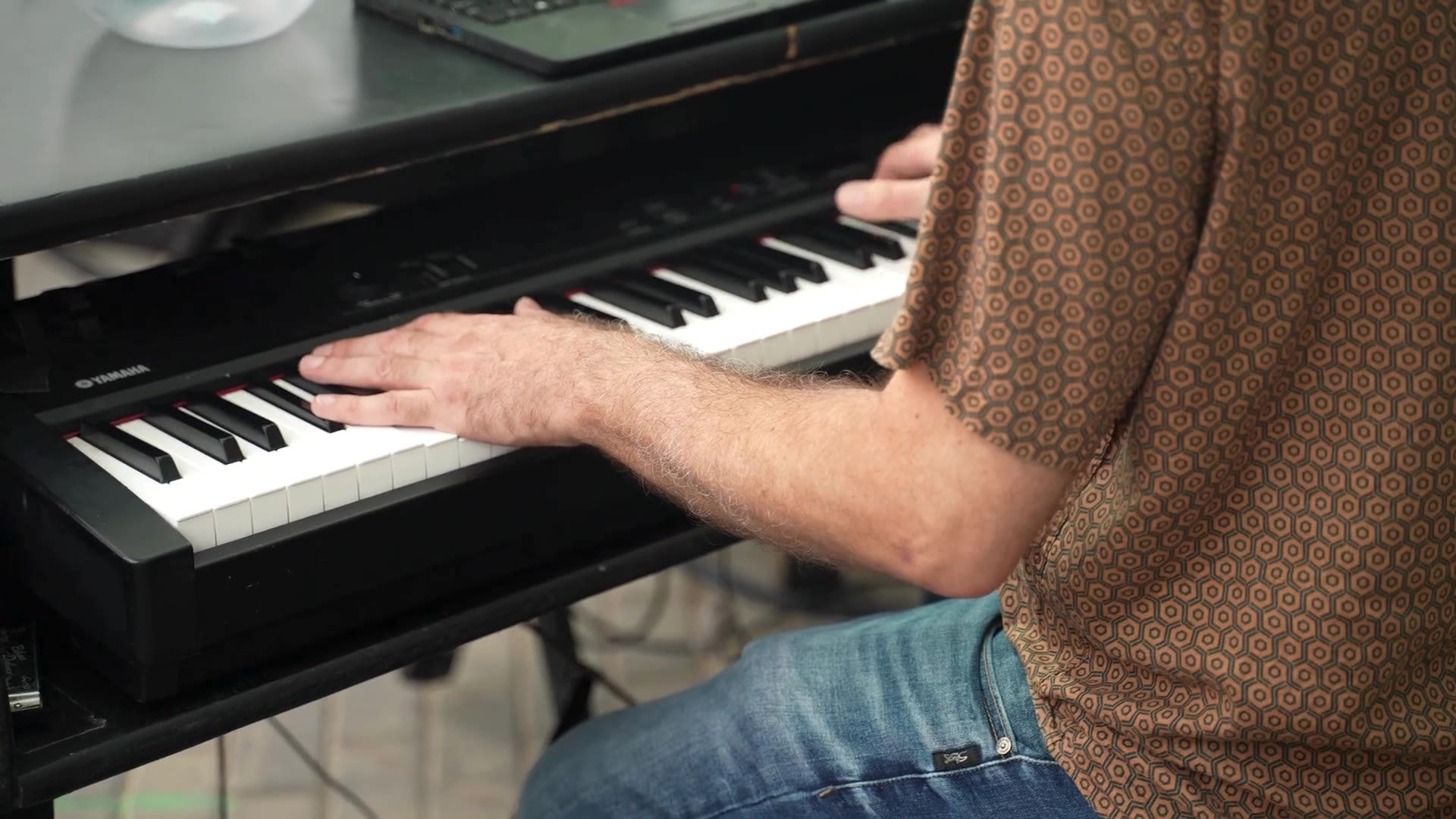 Pianist performing during a dueling piano show